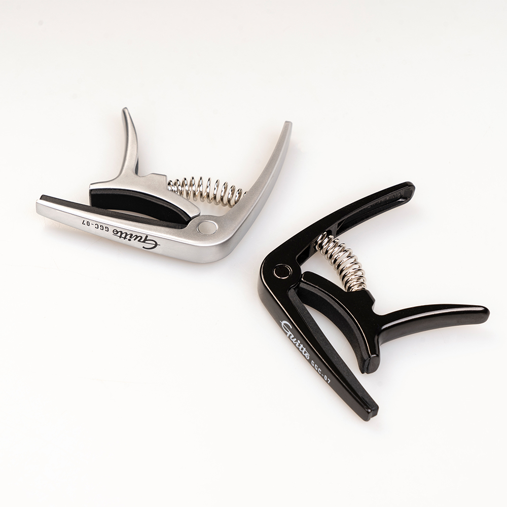 GUITTO GGC-07 Ukulele Capo Qui - đánh giá và giá Musical Instrument Types